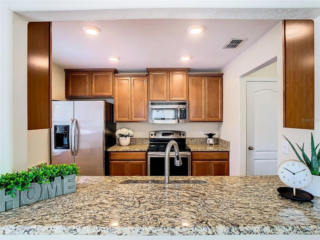 Photo of 9868 Trumpet Vine Loop, Trinity, FL 34655 (MLS # TB8430356)