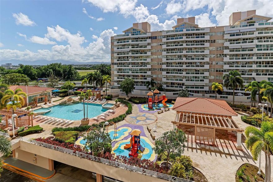 Bright and welcoming, this apartment at Astralis, Isla Verde is filled with natural light thanks to wide windows and an open layout that connects the living, dining, and a newly remodeled kitchen with modern finishes. The residence offers 3 bedrooms, 2.5 bathrooms, a laundry room, inverter A/C units, elegant lighting, and two independent covered parking spaces. Bedrooms are comfortably spacious with generous storage.
Enjoy resort-style living with 24/7 security, a resort-style pool, jacuzzi, modern gym, sauna, children’s playground, and lush tropical grounds. The location is unbeatable: steps from Isla Verde Beach, with easy access to major highways and minutes to supermarkets, restaurants, casinos, hotels, schools, San Juan International Airport (SJU), and Old San Juan.
Highlights: abundant natural light; remodeled kitchen and baths; spacious bedrooms; two covered parking spaces; gym, pool, jacuzzi, sauna, playground, and 24/7 security—all in the heart of Isla Verde.
If you’re seeking light, comfort, and a turnkey lifestyle in one of Puerto Rico’s most desirable coastal neighborhoods, Astralis delivers.