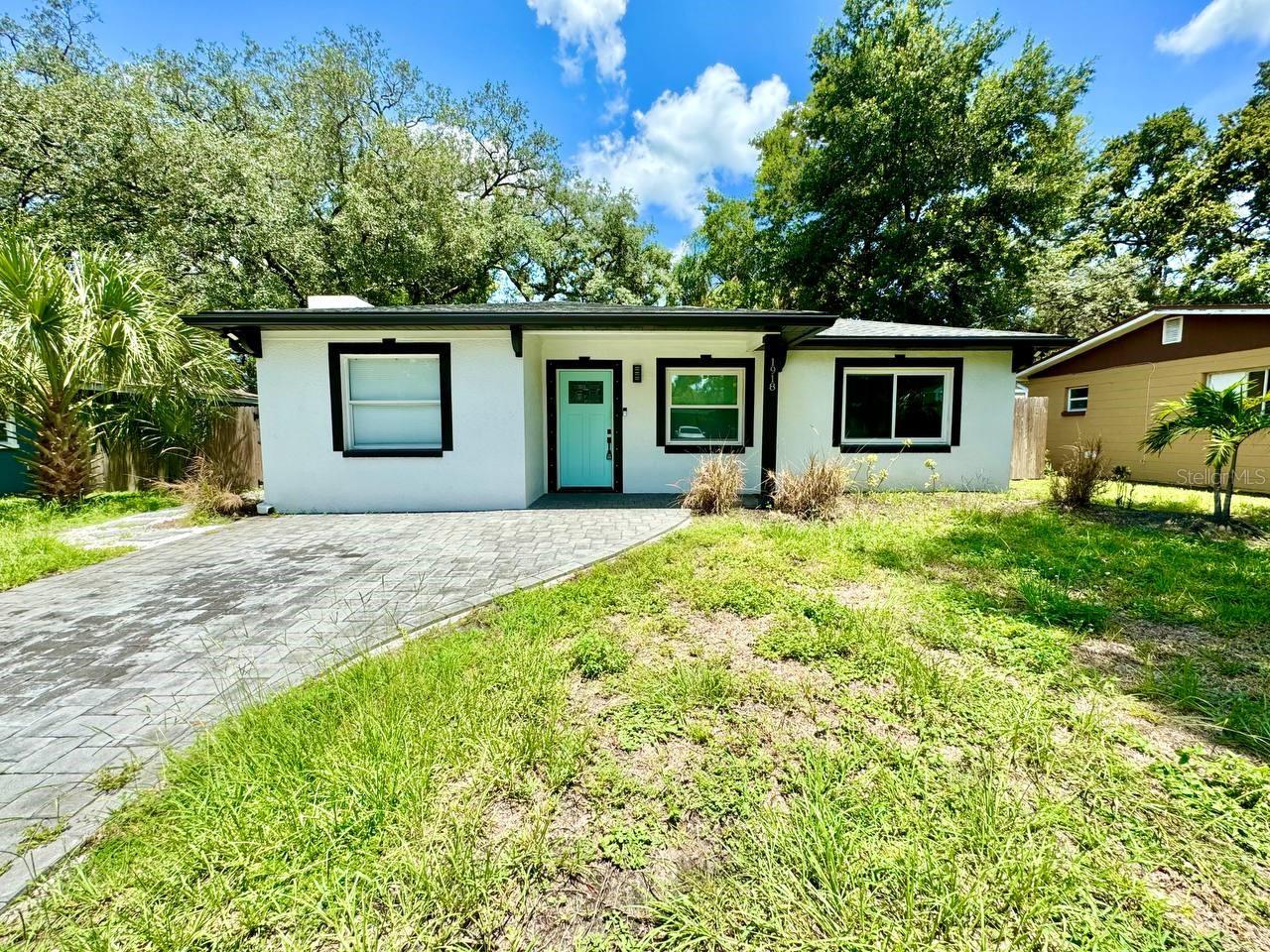 Welcome to your recently remodeled oasis in the heart of Southeast Seminole Heights! This stunning 3-bedroom, 2-bathroom home offers a perfect blend of modern luxury and cozy charm. Step into the open kitchen, featuring soft-close cabinets, quartz countertops, stainless steel appliances, a dry bar, wine fridge, and wine rack perfect for entertaining and culinary adventures. The spacious primary bedroom is a true retreat, boasting a fireplace, a private paved patio, a walk-in closet, and a luxurious bathroom with a beautifully tiled shower. The secondary bedrooms are thoughtfully designed, sharing a guest bathroom with a tiled shower/tub combo. Outside, the fully fenced backyard provides a private haven with a paved patio, ideal for relaxing or hosting gatherings. Don't miss the opportunity to call this beautifully updated home your own! In addition to the advertised base rent, all residents are enrolled in the Resident Benefits Package (RBP) for $50.00/month which includes HVAC air filter delivery, credit building to help boost your credit score with timely rent payments, utility concierge service making utility connection a breeze during your move-in, and much more! More details upon application. Pets welcome, at owners discretion! Occupied and available 09/01/2025!