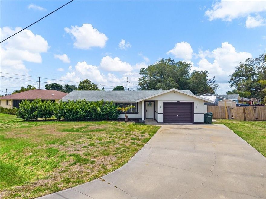 FRESH CLEAN UPDATED LINES DESCRIBE THIS HOUSE ALONG WITH A SEPARATE BUT ATTACHED BEDROOM/BATHROOM SUITE FEATURING ITS OWN PRIVATE ENTRANCE FOR A POTENTIAL IN LAW SUITE, OFFICE, GUEST SUITE, ETC. Tax records state a 2BR home but this suite was already here when the current owners purchased it making it a true 3/2. This property sits on an oversized lot with NO HOA & NO DEED RESTRICTIONS AND NO FLOOD ZONE offering you extra room to breathe and grow including room to park your toys. INSIDE you will find beautiful terrazzo and ceramic tile floors creating seamless lines and maintenance free living spaces. Many NEW UPDATES to this home include a NEW WATER HEATER IN 2026, some NEW HURRICANE PROOF WINDOWS IN 2025, NEW KITCHEN WITH SOLID SURFACE COUNTERS IN 2024, NEW CONCRETE PAD out back for a potential outdoor kitchen, firepit area, basketball court, etc in 2023, NEW ROOF IN 2019, NEW AC in 2017. Enjoy your early morning coffee or an evening cocktail in the screened in porch out back. You will have peace of mind with the fenced in yard for your furry friends. In this sought after community, as a bonus, residents have the option to join the voluntary HOA, which provides access to a ferry and community boat ramp which will take you to a private beach where you can enjoy the best that our beautiful area has to offer-SOOTHING SUNSET WALKS, QUIET SPACES TO DECOMPRESS, & PURE NATURE JOY FOR THE WHOLE FAMILY. With all your shopping and restaurants within minutes, this property checks all your boxes so RUN-DONT WALK to schedule your private showing.