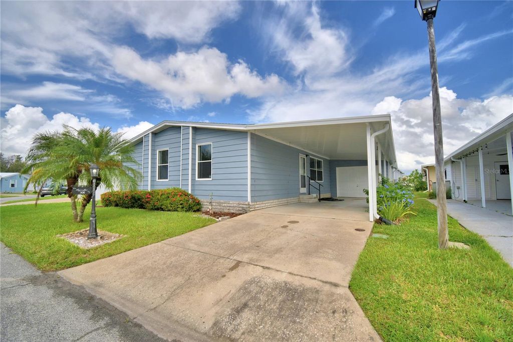 Photo of 306 Townbridge Drive, Haines City, FL 33844 (MLS # P4936500)