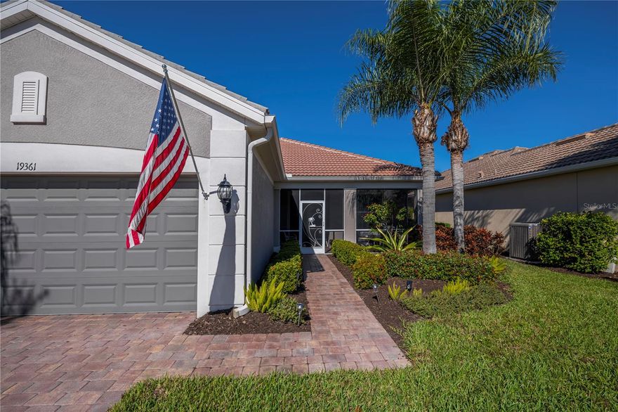 MOTIVATED SELLER !!!!!! HUGE PRICE REDUCTION on this two-bedroom, two-bath plus den Classic Surrey Crest single-family home in IslandWalk is move-in ready and beautifully upgraded. The home features HURRICANE-IMPACT WINDOWS, remote-controlled STORM SMART LANAI SCREENS, and a 20' x 12' FRONT SCREENED-IN PORCH.

You’ll find elegant, HIGH-END REMODELS TO BOTH BATHROOMS AND THE KITCHEN. This meticulously maintained home also includes a NEWER A/C AND HOT-WATER HEATER, EPOXY GARAGE FLOORING, and ADDED ATTIC INSULATION. Recently repainted in neutral colors inside and out, the home sits on a PREMIUM “HAMMERHEAD" LOT.

Watch the sunrise from the front porch and enjoy magnificent sunsets from the private lanai with expansive views of the greenspace. Beautiful ENGINEERED HARDWOOD flooring runs throughout the main living areas, with tile in the baths and kitchen. CROWN MOLDING and PLANTATION SHUTTERS are featured THROUGHOUT the home.

The remodeled kitchen boasts NEW STAINLESS STEEL APPLIANCES, QUARTZ COUNTERTOPS a glass backsplash, and elegant pendant lights with dimmers over the breakfast bar. The drawers are soft-close and include wire pull-out racks for added convenience.

The well-organized laundry room includes a NEW WASHER AND DRYER, seven storage cabinets, a folding area, and a built-in laundry tub. The REMODELED GUEST BATHROOM features a walk-in shower with glass doors, tile to the ceiling, quartz countertops, and elegant fixtures and lighting.

The fabulous PRIMARY SUITE offers a one-of-a-kind upgraded bath with a walk-in shower, quartz countertops, floor-to-ceiling tile with decorative accents, a built-in bench, and stone flooring. The spacious walk-in closet includes double racks for added storage.

Also included is a 20.5" x 20" x 18" waterproof and fireproof safe, bolted to the floor. Additional features include a retractable front door screen, a Vertiglide shade across the lanai doors, and a TV mounted on the lanai wall.

Located in the Wellen Park District, the home is just minutes from shopping, dining, medical facilities, and CoolToday Park. IslandWalk is one of the area’s most active communities, offering three clubhouses, three pools, extensive social and recreational activities, and even a dog park.

THIS EXCEPTIONAL HOME IS TRULY A MUST-SEE.