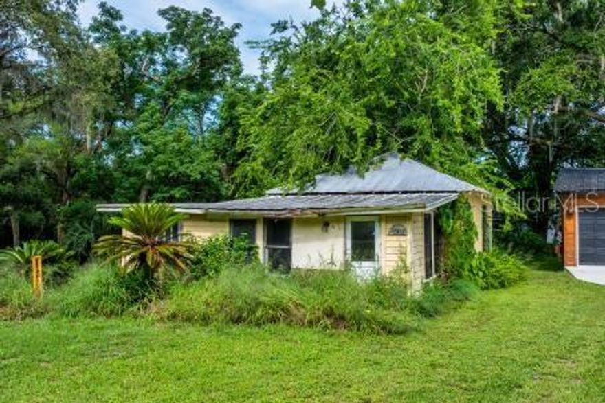 2 Separate Adjoining Lots, 1 Single Family 1/1 HOME & 1 VACANT RESIDENTIAL LOT!  Location, Location, in a small Unincorporated Neighborhood, with NO HOA!   Check with Lake County to see what you all can build here.  The Single Family Home is on the largest lot & the  Garage is on the other parcel.  Both are Tear- downs, the Seller has left them for the next Owner to possibly save on impact fees.  

Walking Distance to Lake Minneola Chain of Lakes, short commute to Lake Minneola's Public Boat Launch, close to the Tiki Bar, Downtown Minneola & Downtown Clermont. Less than a half of a mile drive from US Highway 27.  Close to the FL Turnpike & Highway 50.  Near many popular Stores, Restaurants, 2 Hospitals & many Medical Offices.  Lot sizes 103’ x 176’ and 100 x 101',  Bring your Home Business, live and work from home. Build a Compound.  AirBNB allowed, check out land use here in Unincorporated Neighborhood, with less tax millage rate here.