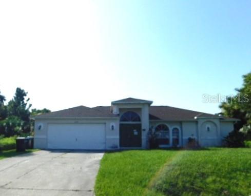 Spacious home with much potential. 3 bedrooms, 2 baths, split bedroom plan. Large open concept living room with sliders leading to the back screened porch area. With a little TLC this home will be great again. Buyer is advised to have complete and thorough inspections done and to verify all information. Seller/Agents have no knowledge of property conditions. Being Sold As-Is.