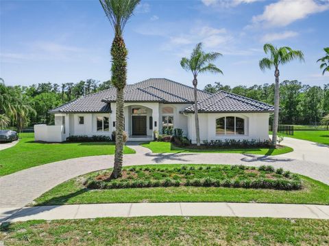 Photo of 3868 Hunters Isle Dr, Orlando, FL 32837 (MLS # O6400707)