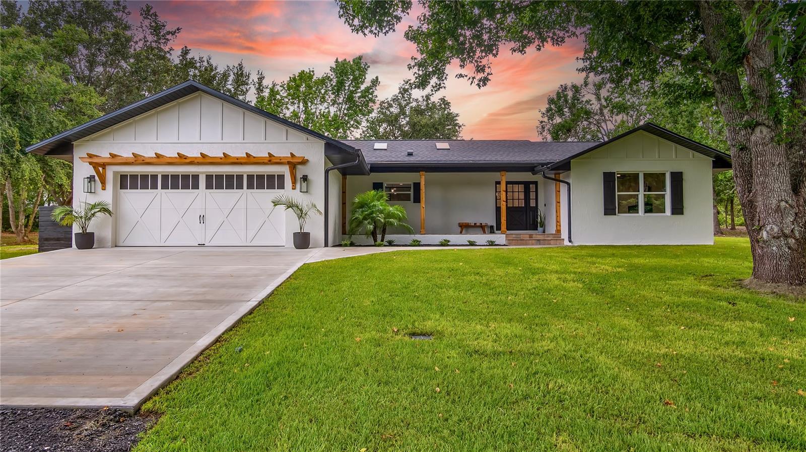 Stunning Completely Remodeled Ranch-Style Home on 4.75 Acres — A True Central Florida Gem with NO HOA!
Discover unparalleled luxury and serene country living in this meticulously remodeled 4-bedroom, 3-bathroom estate, boasting 2,682 sq ft of exquisite living space on a sprawling 4.75 acre property. No detail has been overlooked in this transformation, featuring brand-new roof, HVAC, electrical, plumbing, windows, doors, garage, and all interior finishes — all designed to provide modern comfort with timeless elegance.
Step inside to experience high-end finishes and custom details throughout, creating an inviting atmosphere that effortlessly blends sophistication with warmth. The expansive screened-in pool and spa area open onto a massive lanai, offering the perfect setting for outdoor entertaining or peaceful relaxation amidst nature’s beauty.
Animal lovers and equestrian enthusiasts will be captivated by the 5-stall stable and direct access to the equestrian trail right from the backyard. Whether you’re caring for horses or simply craving wide-open spaces, this property delivers endless opportunity and tranquility.
Additional features include a 1,664 sq ft versatile shop with ample space to convert a portion into a private in-law suite, a spacious pole barn ideal for storing RVs, tractors, and toys, and a fully fenced yard with a remote and keypad gated entrance ensuring privacy and security. Best of all — enjoy complete freedom with NO HOA!
Energy-conscious buyers will appreciate the paid-off, full-home operating solar panel system and full-home backup generator, making this home not only beautiful but efficient and reliable.
Located just minutes from Montverde Academy, one of the world’s top private schools, this exceptional ranch-style home offers a rare chance to live the idyllic farm lifestyle in one of Central Florida’s most desirable zip codes.
Don’t miss your opportunity to own this one-of-a-kind property — a perfect blend of luxury, comfort, and country charm without the restrictions of an HOA!