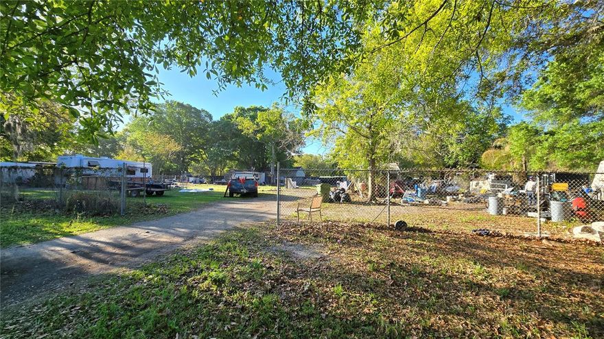 Build your future in the heart of fast-growing Wesley Chapel! This spacious .59-acre residential lot offers a fantastic opportunity for homeowners, investors, or builders looking for flexibility and value. Previously home to a mobile residence that has since been removed, the property is ready for your vision—whether you’re planning to install a new mobile home or construct a custom site-built home.

Enjoy the convenience of existing public water and a septic system already in place, helping to reduce upfront development costs and streamline your build process. With over 1/2 an acre, there’s ample space for outdoor living, storage, or even additional improvements.

Ideally located near shopping, dining, schools, and major roadways, this property offers the perfect balance of peaceful living and everyday convenience. Whether you're looking to build now or invest for the future, this is a rare opportunity to secure a sizable homesite in one of Pasco County’s most desirable and rapidly growing areas.

Don’t miss your chance to bring your vision to life—schedule a visit today!