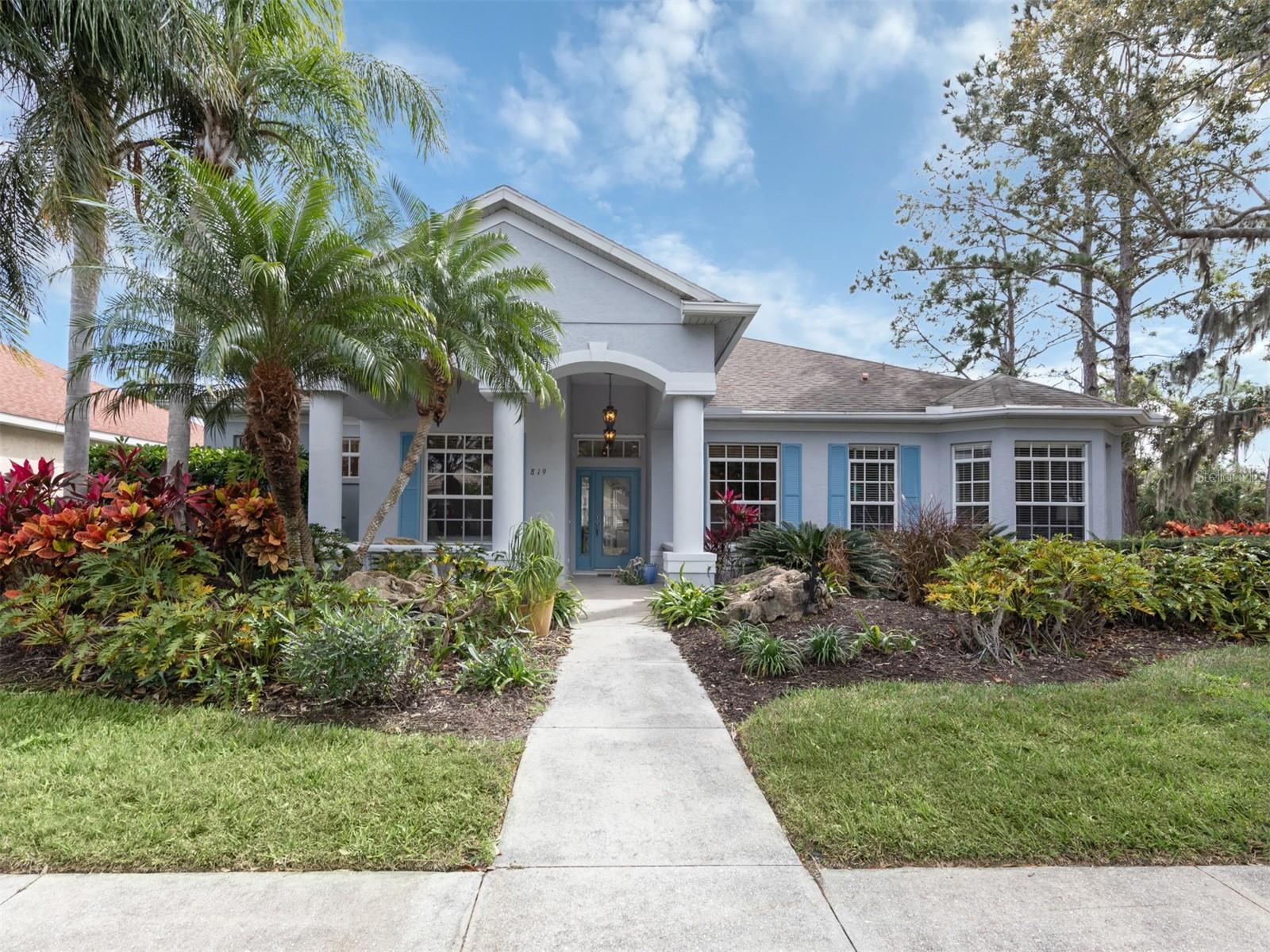 A new 2025 roof. This stunning 2,145-square-foot pool home is in the premier community of Rivendell. Live so beautifully! This maintenance-free, tropically landscaped corner lot home has been eloquently updated and maintained. Featuring four bedrooms, formal dining room, two baths, two-car garage, fenced-in backyard, beautiful pool and lanai, and tile throughout most of the home. The inviting front porch is so welcoming to guests and the ideal place to enjoy morning coffee. Go inside through the beautiful glass door and you will be greeted by a meticulously maintained open, spacious floor plan and large foyer filled with an abundance of natural light. The well-designed split layout seamlessly connects the kitchen, cafe and great room, and formal dining room, creating an ideal space for entertaining family and friends. The kitchen is a chef's dream and has been updated with cabinetry, custom wine racks, granite countertops, stainless appliances, built-in desk, pantry and breakfast bar. The cafe features an aquarium window that overlooks the sparkling pool and is the ideal place to grab a quick bite before heading to the beach. The primary is large and boasts dual walk-in closets, sliding door access to the lanai and private en suite. The en suite has been updated with solid wood cabinetry, granite countertops, inlaid tile flooring, dual sinks, a garden tub, walk-in shower, linen closet and private water closet. Plenty of room for two to get ready for a night on the town. On the other side of the home, the additional two bedrooms, full bath and a pocket door create a tropical oasis for guests. The second bedroom is at the front of the house and could easily function as a den or playroom. The third bedroom includes a large bay window for extra light, and closet. In the fourth bedroom, you will find a built-in desk and cabinetry for extra storage, and the laundry room is off the kitchen and offers a large utility sink, additional cabinetry and closet for extra storage. The screened-in lanai and pool have been beautifully updated with pavers and include a fenced-in area, which would be ideal for pets. Whether you prefer lounging on the patio or hosting a barbecue, you'll find this outdoor space to be a delightful extension of the home. The low HOA fees include lawn and shrub care, heated pool, playground and walking trails with no CDD, and just a short walk on the private path to Pineview School for the Gifted. Rivendell is a well-planned and serene community with lakes and many green spaces, and abuts to Oscar Scherer Park and 200 acres of Venice Preserves. There is a recreational path to Pine View School for the Gifted and near Legacy Bike Trail. It is a pleasantly secluded neighborhood in south Sarasota, close to pristine Gulf beaches, and in between Sarasota and Venice for cultural, restaurant and shopping opportunities. Furniture available for purchase.