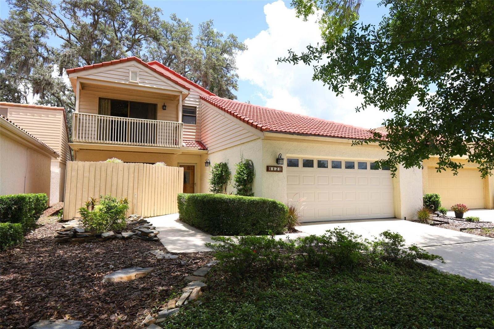 Welcome to your future home in the heart of Tuskawilla! This charming 3-bedroom, 2.5-bath two-story gem is tucked away in one of Winter Springs’ most sought-after communities. With the primary suite conveniently located on the first floor, you’ll enjoy ultimate comfort and privacy. The spacious ensuite bath opens to its own private deck—perfect for morning coffee or evening relaxation—and there’s a screened-in patio on the other side for even more outdoor enjoyment. The first floor also features a flex space (ideal for a home office, playroom, or creative studio), a welcoming living room, a generous kitchen with eat-in nook, a separate dining room, and a large indoor laundry room. Upstairs, you’ll find two additional bedrooms, each with private balcony access—a rare and delightful feature! Located near Tuskawilla Country Club, Trotwood Park, scenic walking trails, and zoned for top-rated schools, this home is also just minutes from shopping, dining, and medical facilities. As an added bonus, the home comes with a 1-year home warranty for your peace of mind. Don’t miss this wonderful opportunity—schedule your private tour today!