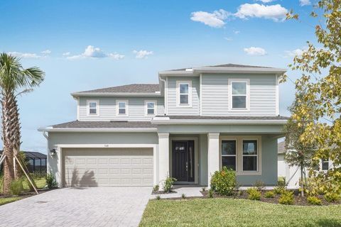 Photo of 548 Moon Shell Circle, New Smyrna Beach, FL 32168 (MLS # O6296692)