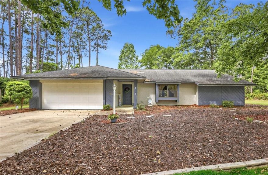 Welcome to your peaceful retreat in beautiful Palm Coast! This charming 3-bedroom, 2-bath ranch-style home is nestled in a quiet, heavily wooded area, offering privacy and a serene natural setting while still being conveniently close to everything you need.

Step inside to a spacious living room featuring elegant French doors that open to a screened patio—perfect for relaxing or entertaining while enjoying the surrounding greenery. The home has been freshly power washed and the interior is freshly painted, and the carpets have just been professionally cleaned, making it move-in ready. Most areas feature durable tile or vinyl flooring for easy maintenance.

The split floor plan provides added privacy, with a generously sized master suite that includes a walk-in closet plus an additional closet for extra storage. You'll also appreciate the large laundry room and a 2-car garage with attic storage, AC system 2018.

As an added bonus, a large adjacent lot is also available for purchase—ideal for expanding your outdoor space, adding a garden, or simply preserving your privacy.

Located just minutes from shopping, ospitals, and major roadways, this home offers both tranquility and convenience. Plus, you’re only a short drive from the historic charm of St. Augustine and the vibrant beaches of Daytona.
