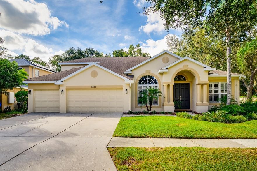 Beautifully updated and meticulously maintained, this spacious 5-bedroom, 4-bath pool home offers over 3,400 square feet of living space in the desirable gated community of Carrollwood Preserve. With outstanding curb appeal and thoughtful upgrades throughout, this two-story home features a formal dining room, a generous family room, and an open kitchen with maple cabinetry, granite countertops, and sleek black stainless steel appliances. Sliding glass doors lead to a covered paver patio and a heated saltwater pool with a newer heater and pump, while the oversized backyard offers ample room for a play area or pets. The stunning primary suite on the main floor includes new wood flooring, a bay window with a cozy sitting area, a custom built-in closet system, and a fully renovated en suite bath with dual vanities, a walk-in shower, and a free-standing soaking tub. Also on the main level are three additional bedrooms, two full bathrooms, and a dedicated office. Upstairs, you'll find a spacious loft ideal for a media room, playroom, or home office, along with a private bedroom, full bath, and a large storage closet with a secure safe. Plantation shutters are featured throughout the home. Located near top-rated schools, convenient bus stops, shopping, dining, and major roadways including the Veterans Expressway, Dale Mabry Hwy, and I-275. Recent updates include a new roof (2019), water heater (2025), upstairs A/C handler (2024), and downstairs A/C handler (2025). Don’t miss your opportunity to own this exceptional Carrollwood home—schedule your private tour today!