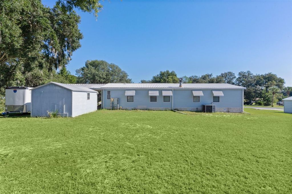Photo of 13904 County Road 109d, Lady Lake, FL 32159 (MLS # G5111164)