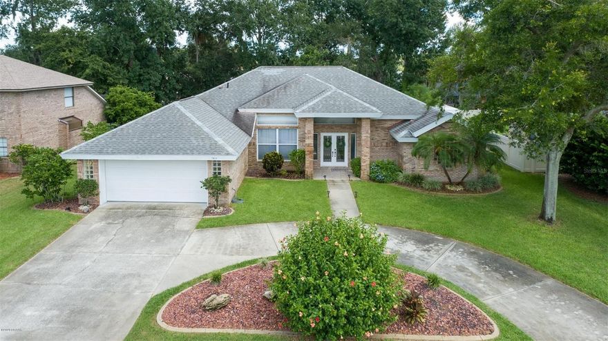 Looking for a large family sized home with a pool, but discouraged by the current pricing out there? Look no further! This 4BR/3BTH POOL brick home with circular drive has everything buyers, today, are looking for! What is at the top of buyers' WANT list? A split bedroom floor plan, volume ceilings, inside laundry, open concept floor plan, a large outdoor living area and a decent size pool, and these are ALL present in this home! Let's start with the four bedrooms, which are split for privacy. The master suite is on the right side of the home while two bedrooms and a pool bath are on the left rear side of the home and another bedroom with full bath is on the left front side of the home. The center of the home features an abundance of glass and with vaulted ceilings, feels much larger than

it is. The kitchen offers white raised panel cabinetry, all new stainless steel appliances, solid surface countertops, plenty of storage and a breakfast bar. The owners suite offers a beautiful view of the lanai and pool, an oversized bath with garden tub, separate oversized shower, dual sinks and walk in closet with custom closets. There is a large covered lanai, which offers plenty of room for a table/chairs, couch, television and/or grill! The pool is large enough for laps and offers the utmost of privacy This home is move in ready and will not disappoint! All information taken from the tax record and, while deemed reliable, cannot be guaranteed. ;Water: City