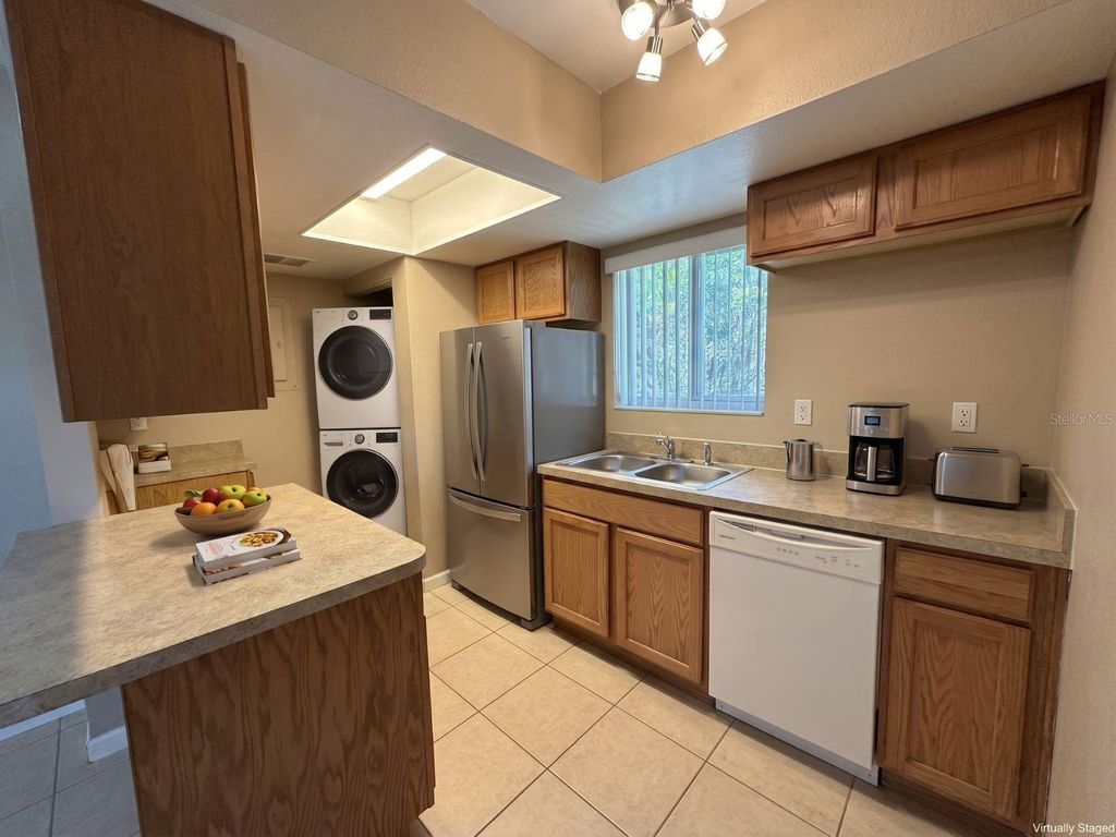 Photo of 5568 Green Shadows Place #21-1, Orlando, FL 32811 (MLS # O6410329)