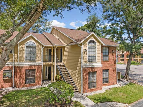 Photo of 8653 Mallard Reserve Drive #103, Tampa, FL 33614 (MLS # W7888650)