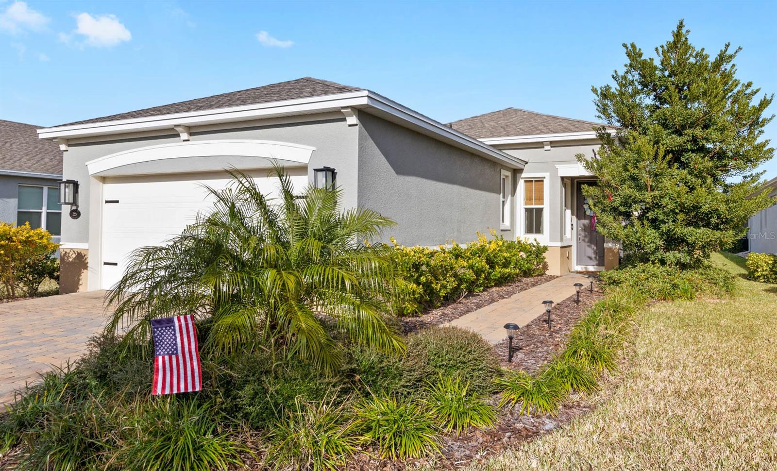 Built in 2020 by Kolter Homes, this former model home features 1,507 square feet of impeccably designed living space with 2 spacious bedrooms PLUS flex room, 2 bathrooms and stunning upgrades. Nestled just outside of a quiet cul-de-sac in the beautiful Victoria Hills community, this Azalea floor plan offers both tranquility and privacy with no rear neighbors. Step inside and be wowed by soaring ceilings, natural light, wood look tile, a gourmet kitchen boasting stunning 42-inch shaker cabinetry, sparkling quartz countertops, stainless steel appliances with a gas range, and a fantastic walk-in pantry. Gorgeous fixtures and thoughtful touches like the tray ceilings and custom bamboo roman shades adorning every window, make this home feel like it was designed just for you. New luxury vinyl flooring was recently added to the primary suite as well. Just 5 minutes from I-4, you'll have easy access to all of Central Florida’s famous attractions. Downtown Orlando is only a 35-minute drive away, and the world-famous Daytona and New Smyrna beaches are just 30 minutes from your doorstep. For a taste of local charm, Historic Downtown DeLand—with its lively festivals, eclectic shops, and fantastic eateries—is a short 15-minute drive. The Victoria Hills community, located within the master-planned development of Victoria Park, offers an 18-hole public golf course, a clubhouse, a fitness center, multiple pools, pickleball and tennis courts, scenic walking paths where you can take in Florida’s natural beauty, and even a town center with a coffee shop, medical services, and a yoga studio. It's the perfect place to connect with neighbors!