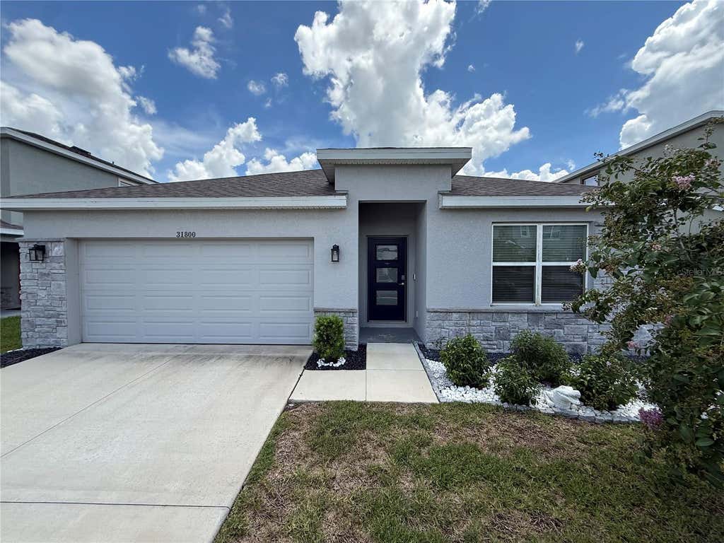 Photo of 31800 Oyster Trellis Lane, Wesley Chapel, FL 33545 (MLS # TB8534509)