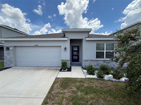 Photo of 31800 Oyster Trellis Lane, Wesley Chapel, FL 33545 (MLS # TB8534509)