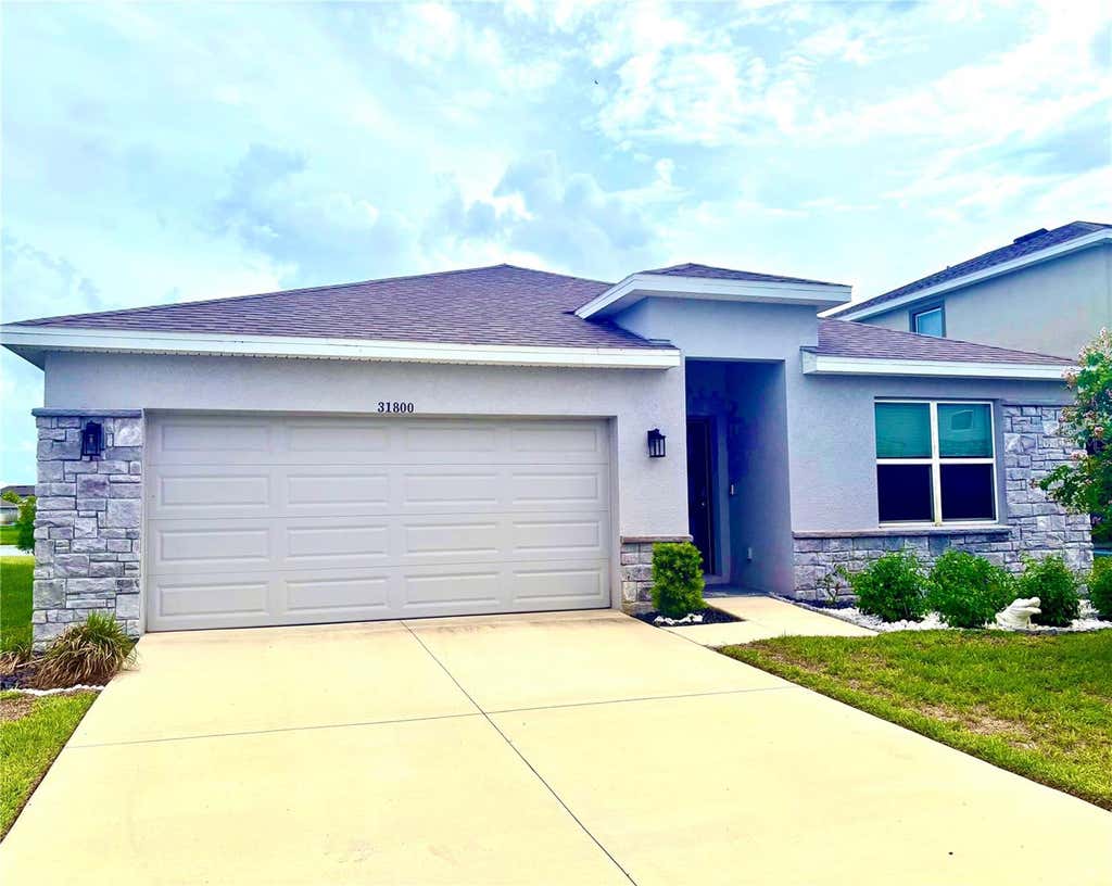 Photo of 31800 Oyster Trellis Lane, Wesley Chapel, FL 33545 (MLS # TB8534509)