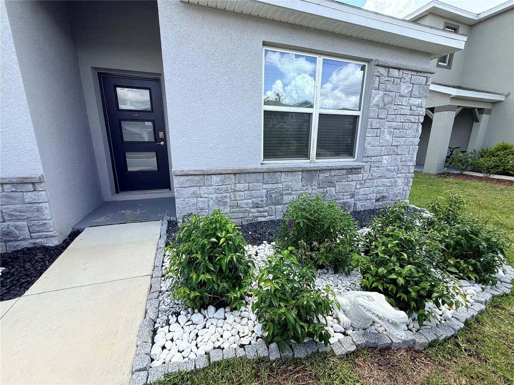 Photo of 31800 Oyster Trellis Lane, Wesley Chapel, FL 33545 (MLS # TB8534509)