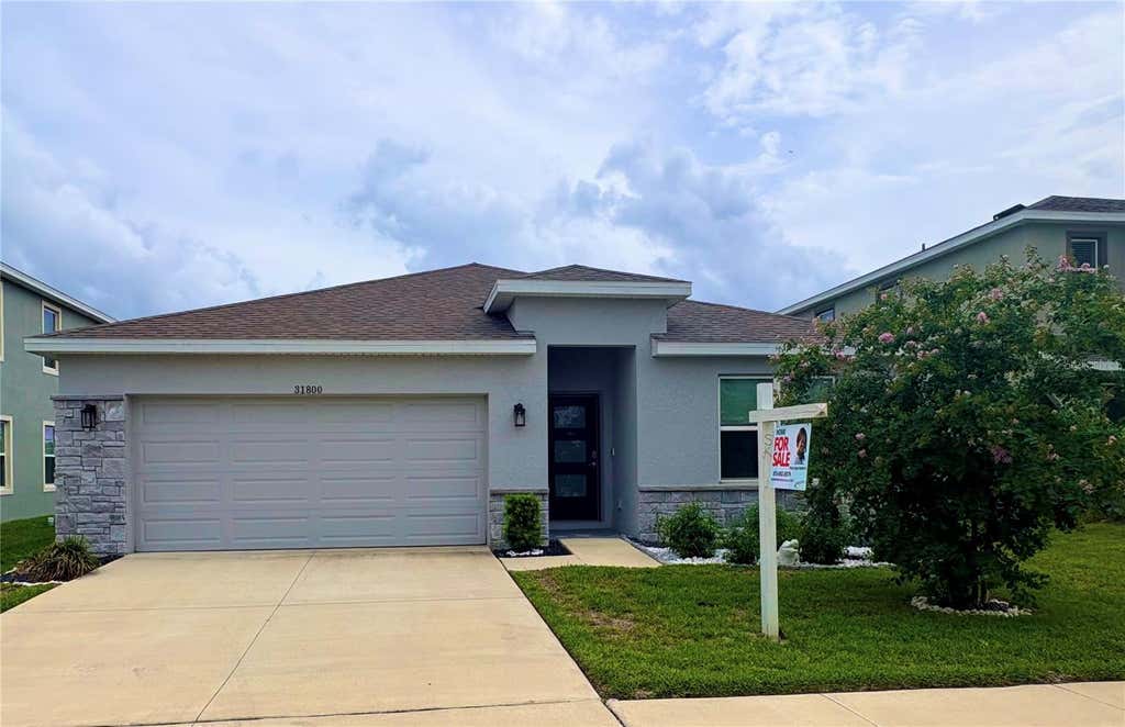 Photo of 31800 Oyster Trellis Lane, Wesley Chapel, FL 33545 (MLS # TB8534509)