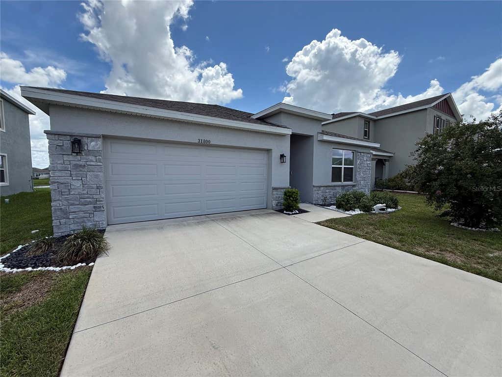 Photo of 31800 Oyster Trellis Lane, Wesley Chapel, FL 33545 (MLS # TB8534509)