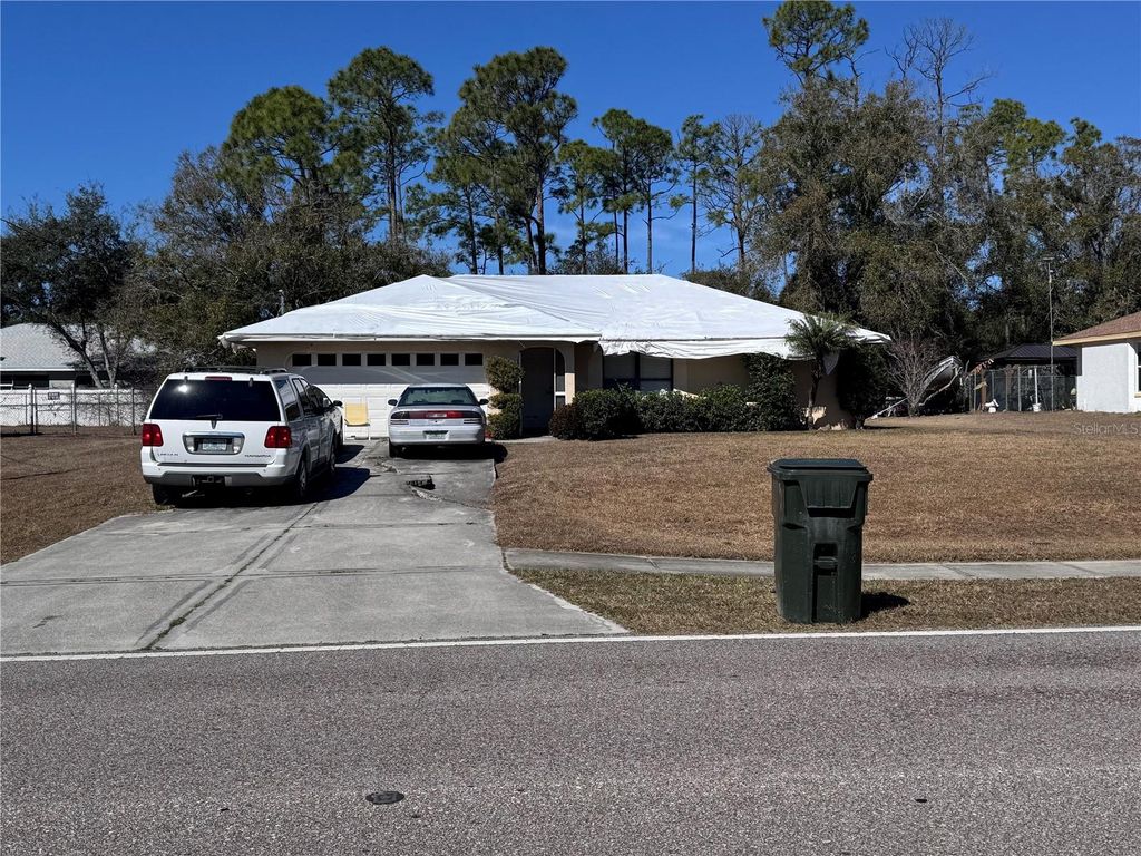 Photo of 3589 N Chamberlain Boulevard, North Port, FL 34286 (MLS # C7521964)