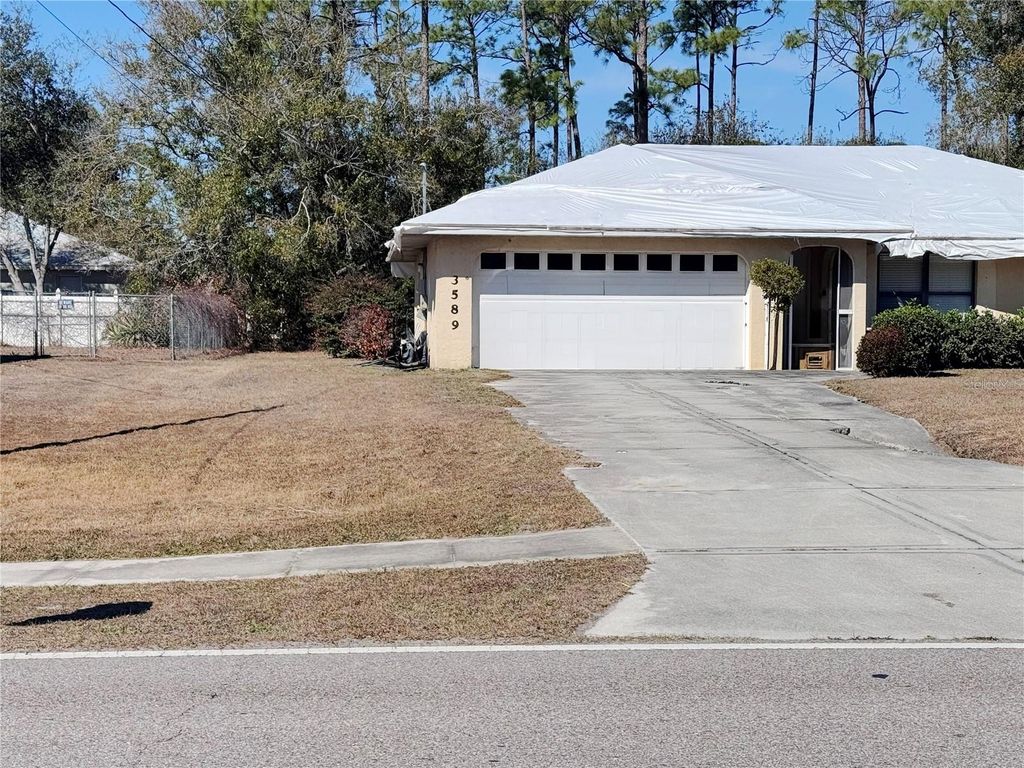 Photo of 3589 N Chamberlain Boulevard, North Port, FL 34286 (MLS # C7521964)