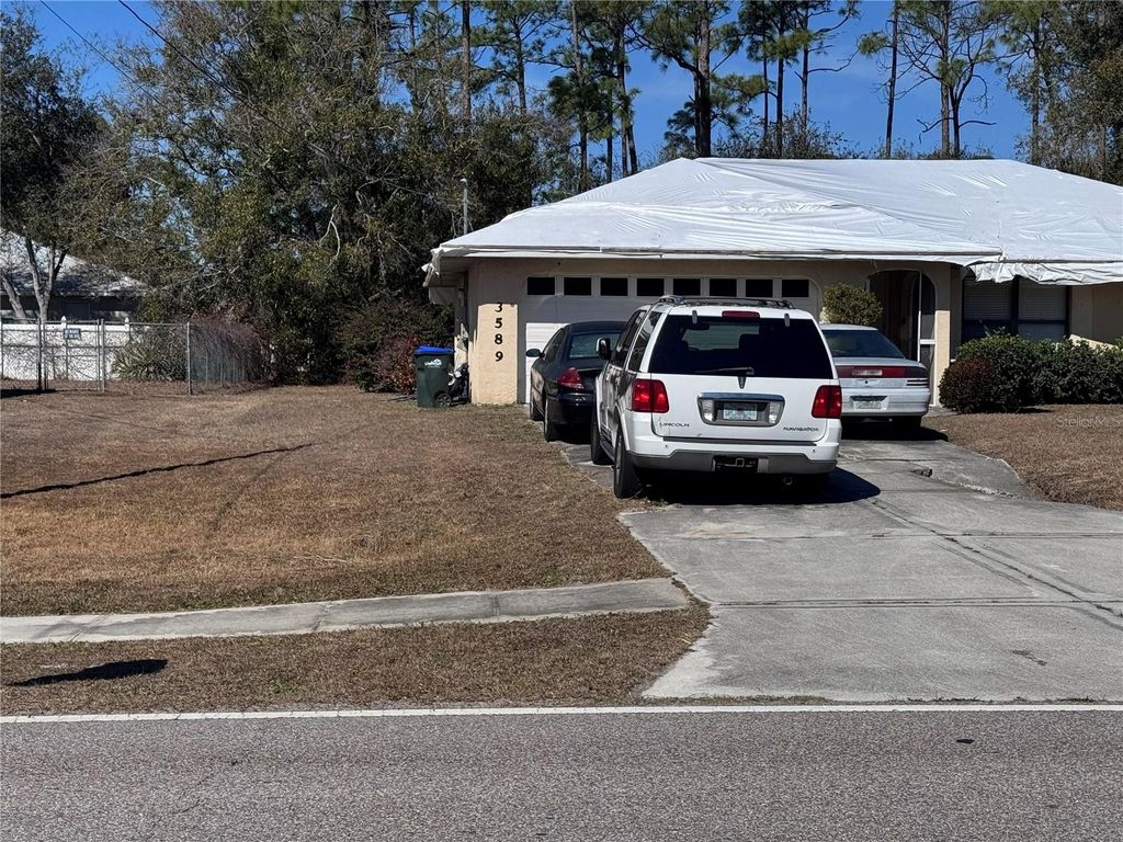 Photo of 3589 N Chamberlain Boulevard, North Port, FL 34286 (MLS # C7521964)