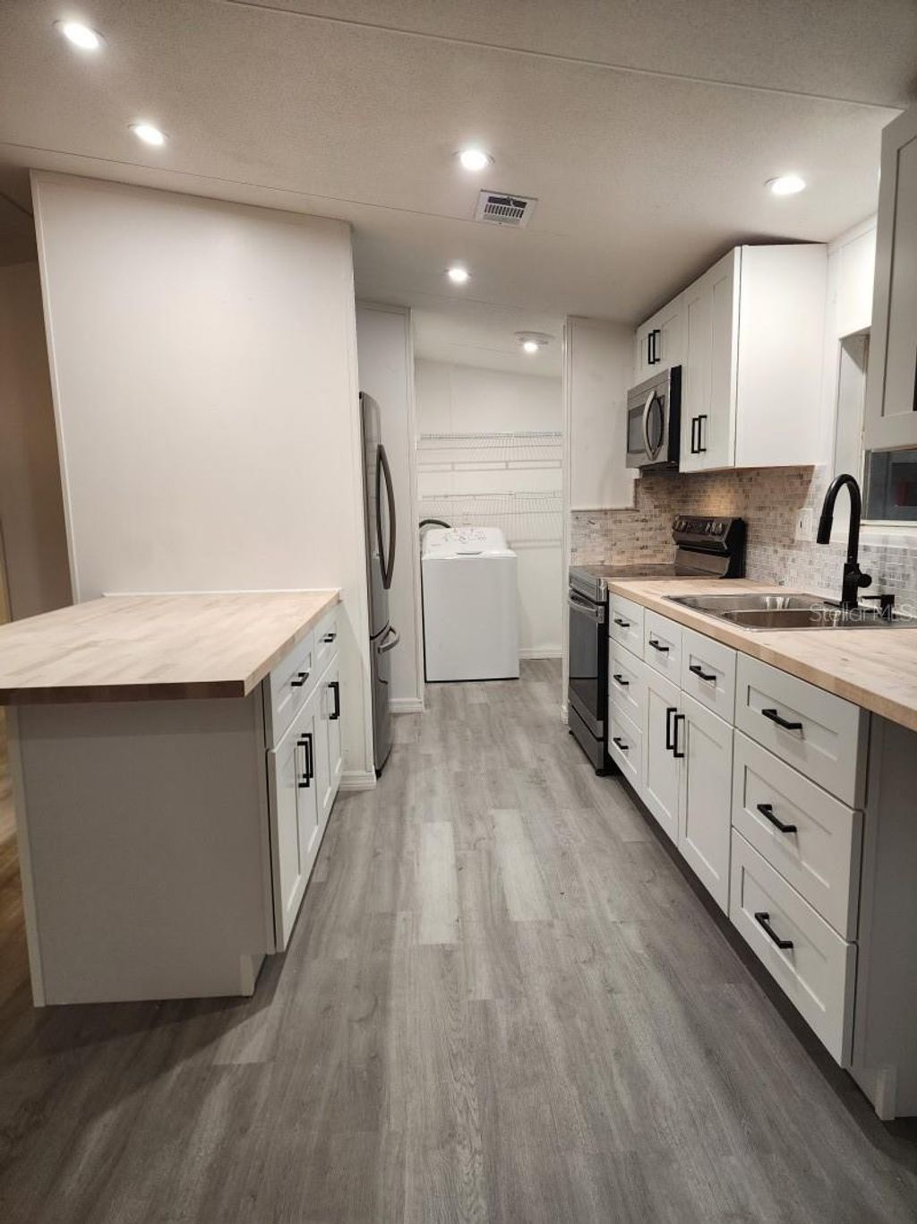 Photo of 775 NE 80th Avenue, Okeechobee, FL 34974 (MLS # A4681210)