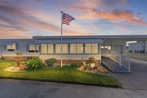 Photo of 20 Captains Point, Fruitland Park, FL 34731 (MLS # G5103227)