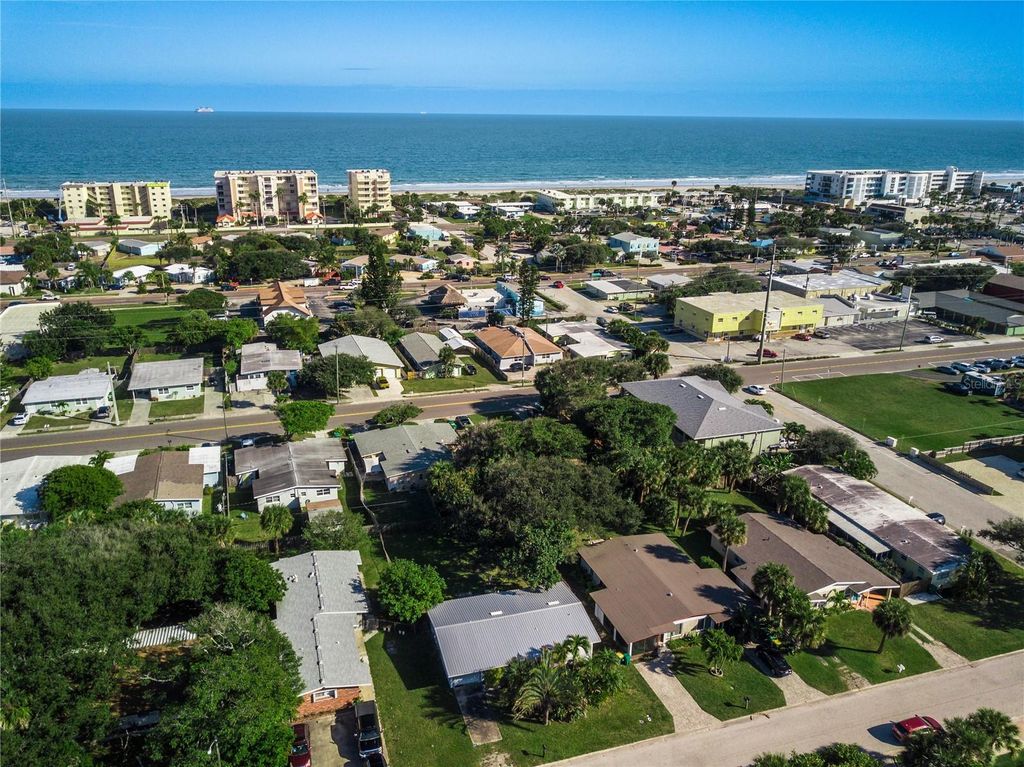 Photo of 227 Woodland Avenue, Cocoa Beach, FL 32931 (MLS # O6409812)