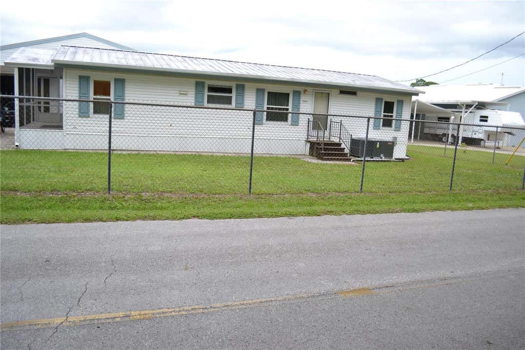 Photo of 5951 SE 158th Court, Ocklawaha, FL 32179 (MLS # OM730019)