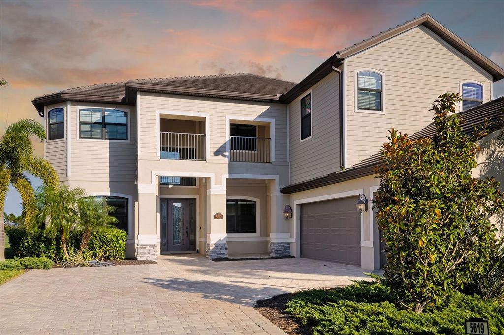 Photo of 5619 Mulligan Way, Bradenton, FL 34211 (MLS # A4673538)