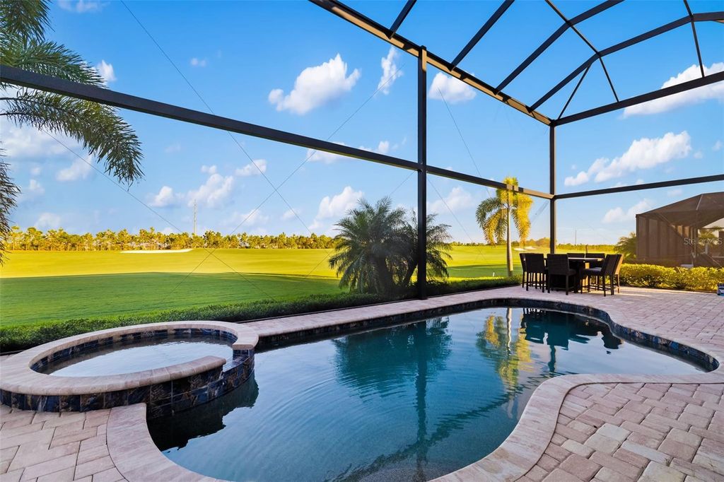 Photo of 5619 Mulligan Way, Bradenton, FL 34211 (MLS # A4673538)