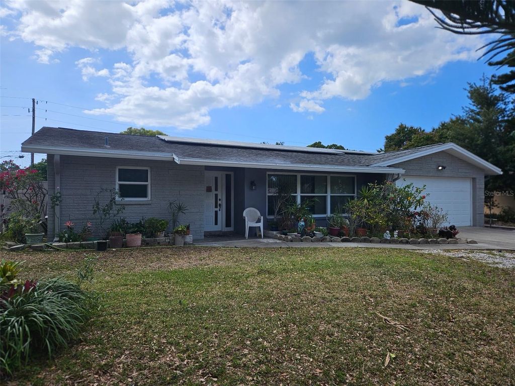 Photo of 1158 Overcash Drive, Dunedin, FL 34698 (MLS # TB8491799)