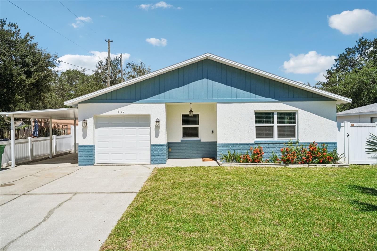 One or more photo(s) has been virtually staged. Welcome to this charming 3-bedroom, 2-bathroom sturdy, block home features HURRICANE IMPACT windows for both peace of mind and energy efficiency. Great South Tampa location- enjoy walkability to Bayshore Boulevard and quick access to MacDill Air Force Base. Step inside and find a light-filled open floor plan with a large living space perfect for relaxing or entertaining. The modern kitchen features wood cabinets, stainless steel appliances, and granite countertops. The private primary suite includes an en-suite bathroom, while two sizable guest bedrooms share a full bath. Outside, the fully fenced backyard includes a spacious paver patio and ample green space for outdoor fun. A side entry and extra paver area offer secure storage or entertaining space. Plus, you'll find a 1-car attached garage, an attached carport, and a convenient backyard shed. With so much to offer, this home is a must-see. Call today to schedule your private tour!
