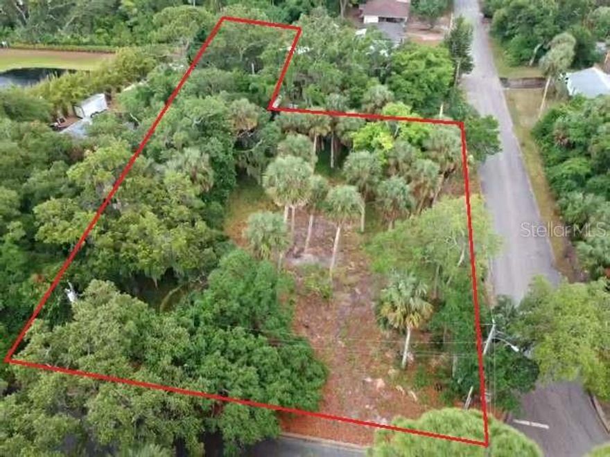 OVERSIZED LOT ALMOST 3/4 OF AN ACRE INCLUDING TWO PARCELS ON THE QUIET CORNER OF ORANGE AVENUE AND VALLEY STREET. COULD BE A GREAT LOCATION FOR YOUR LARGE DREAM HOME IN A PRIVATE SETTING YET CLOSE TO EVERYTHING. THE OVERALL DIMENSIONS COULD POSSIBLY YIELD TWO BUILDABLE LOTS FOR THE INVESTOR OR BUILDER. ONE PARCEL HAD A PREEXISTING HOME THAT HAS BEEN REMOVED. CITY WATER, SEWER, AND POWER ARE ALREADY AT SITE AND THERE COULD POSSIBLY BE IMPACT FEE CREDITS AVAILABLE. CLOSE TO RIVER, BOAT LAUNCH, PARKS AND MINUTES TO THE BEACH. ALSO CONVENIENT TO SHOPPING AND DINING.