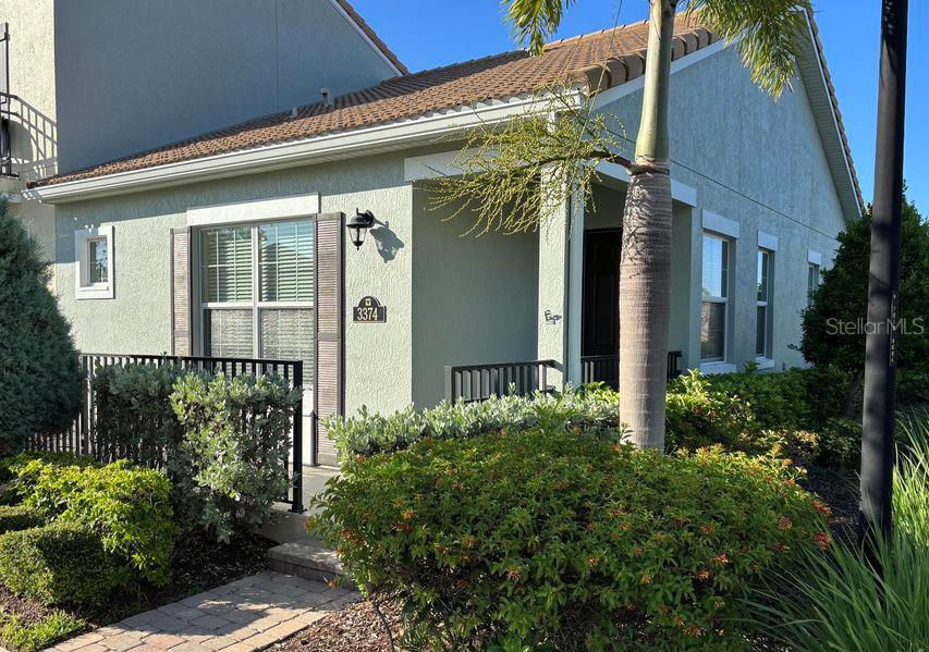 Everything you want and nothing you don't. Immaculate 2BR 2BA, one story townhome in Stadium Villas. Split bedrooms, open floor plan, large two car attached garage, indoor laundry room, generous primary suite with double vanities, walk-in shower and walk-in closet. Generous second bedroom, second bath with shower/tub. High ceilings and side windows make this corner unit light, bright and spacious. Wood-look vinyl flooring and tile throughout. Neutral finishes. Tankless hot water heater, impact glass, ceiling fans, utility sink in garage and plenty of street parking. Small and friendly 67 home community with pool and dog park. Beautifully landscaped. Low HOA fees include exterior maintenance, landscaping, roof. Tile roof keeps HOA fees lower longer. Conveniently located near Publix, banking, restaurants, government center, hospital, shopping, and everything else Viera has to offer. Easy access to I-95, beaches, KSC, Melbourne and Orlando.