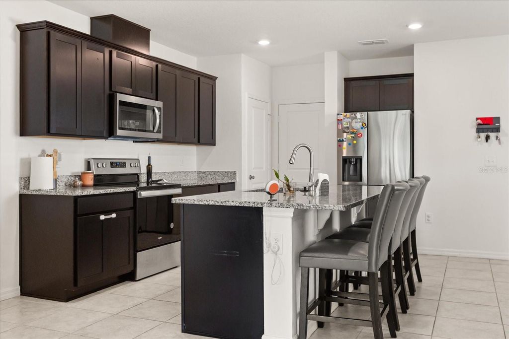 Photo of 1401 Mirabella Circle, Davenport, FL 33897 (MLS # O6311487)