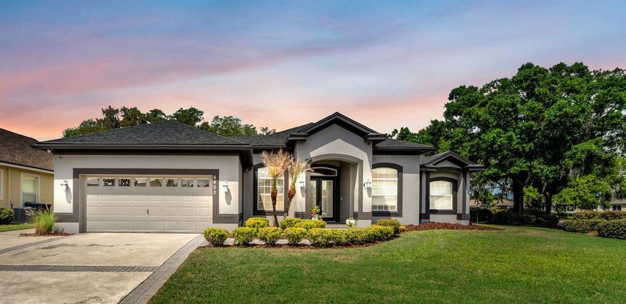 Discover the perfect pool home just in time for the summer, ideally located in the gated Fairway Oaks enclave of the Imperialakes community.  A custom-built residence by Tony Bonnin, ideally situated on a private corner lot with no rear neighbors—offering both privacy and timeless elegance.

From the moment you enter the bright, welcoming foyer, you’ll appreciate the upscale finishes and thoughtful architectural details throughout, including bullnose corners, decorative columns, extensive architectural mouldings, wood-trimmed windows with custom sills, soaring ceilings, crown moulding through-out and impressive 8-foot doors.

The home features a well-designed split floor plan with 3 bedrooms, 3 full baths, and a convenient half bath. Just off the entry, the formal dining room showcases crown molding and elevated ceilings, while a versatile office/den and guest half bath are thoughtfully positioned at the front of the home.

At the heart of the home, the spacious great room is filled with natural light and anchored by double French doors that open to the lanai and pool area—creating a seamless indoor-outdoor living experience. Tile flooring flows throughout the main living areas, enhancing both style and durability.

The kitchen is designed for both function and gathering, offering a walk-in pantry, breakfast bar, and a charming breakfast nook overlooking the sparkling pool—perfect for casual dining with a view.

Privately tucked away, the luxurious primary suite is a true retreat featuring a double trey ceiling, French doors with built-in blinds leading to the lanai, and dual walk-in closets. The en-suite bath offers a spa-like experience with dual vanities, Corian countertops, a jetted garden tub, a walk-in shower with bench and multiple shower heads, and a private toilet area.

On the opposite side of the home, bedroom two features its own en-suite bath with direct access to the pool—ideal for guests or multigenerational living—while the third bedroom is conveniently located near an additional full bath.

Additional highlights include a spacious laundry room with utility sink, built-in cabinetry, and included washer and dryer.

Step outside to your private outdoor oasis, where a beautifully finished pebble-tec pool, expansive covered lanai, and elegant paver decking create the perfect setting for entertaining or relaxing year-round.

The extended two-car garage includes a separate golf cart entry, adding both functionality and convenience.

This exceptional home combines quality craftsmanship, thoughtful design, and resort-style living—schedule your private showing today.