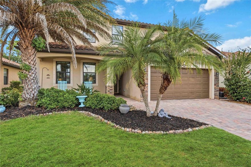 RARELY AVAILABLE MULTI-GENERATIONAL LIVING WITHOUT SACRIFICING STYLE OR PRIVACY. Located in the highly sought-after Gran Paradiso at Wellen Park, this impressive 5-bedroom, 3.5-bath heated-saltwater pool home offers an exceptional private guest retreat perfectly suited for multi-generational living, extended family, long-term guests, or that child who is ready to sprout wings with a little support! Thoughtfully designed for both privacy and connection, the retreat features its own entrance from the front porch, direct pool access, an efficiency kitchen & dining, spacious living area, a 14 x 15 bedroom with walk-in closet, a full bath, and stackable laundry while still seamlessly connected to the main home. Upon entering the primary residence, you’ll find a beautifully appointed, open-concept living area & powder bath. The kitchen showcases quartz countertops, stainless steel appliances, and effortless indoor-outdoor flow to the heated-saltwater pool and expansive paver lanai overlooking a tranquil greenbelt for added privacy. On the upper level, you’ll find a huge 17 x 19 ft. primary bedroom and ensuite complete with double vanities, separate tub, and walk-in shower. The amazing closet is literally a room of its own, sized at 7 x 15. Three additional guest bedrooms, another full bath, a separate laundry, and a versatile loft/flex space ideal for a media room, home office, or play area complete this level. The tandem 3-car garage has room for bikes, beach gear, extra storage, and even the golf cart that can convey. Gran Paradiso residents enjoy an amenity-rich lifestyle featuring a resort-style pool and spa, clubhouse, fitness center, tennis, pickleball, playground, and countless social activities. The HOA includes lawn care, irrigation, cable, and internet. Conveniently located near CoolToday Park, Downtown Venice, Gulf beaches, dining, shopping, and all the excitement of Wellen Park. Schedule your showing today!