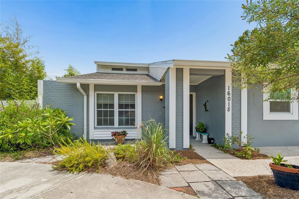 Photo of 16018 Saddlestring Drive, Tampa, FL 33618 (MLS # TB8519348)