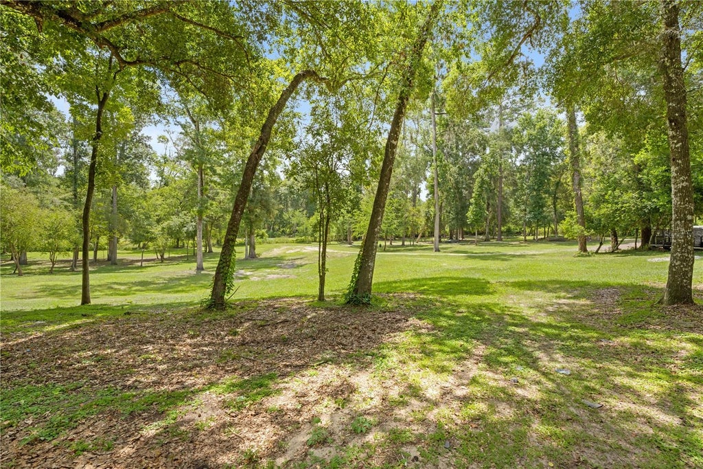 Photo of 3311 Baseball Pond Road, Brooksville, FL 34602 (MLS # W7887123)