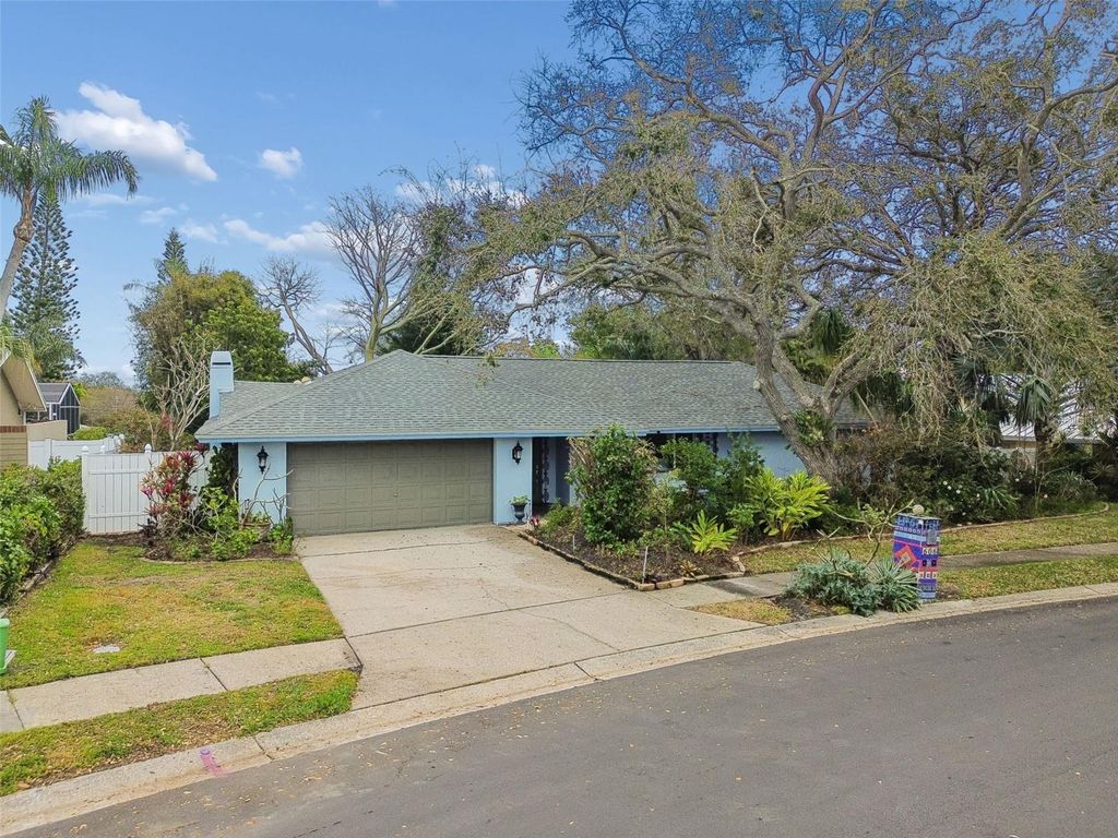 Photo of 606 Grovewood Lane, Largo, FL 33770 (MLS # TB8482189)