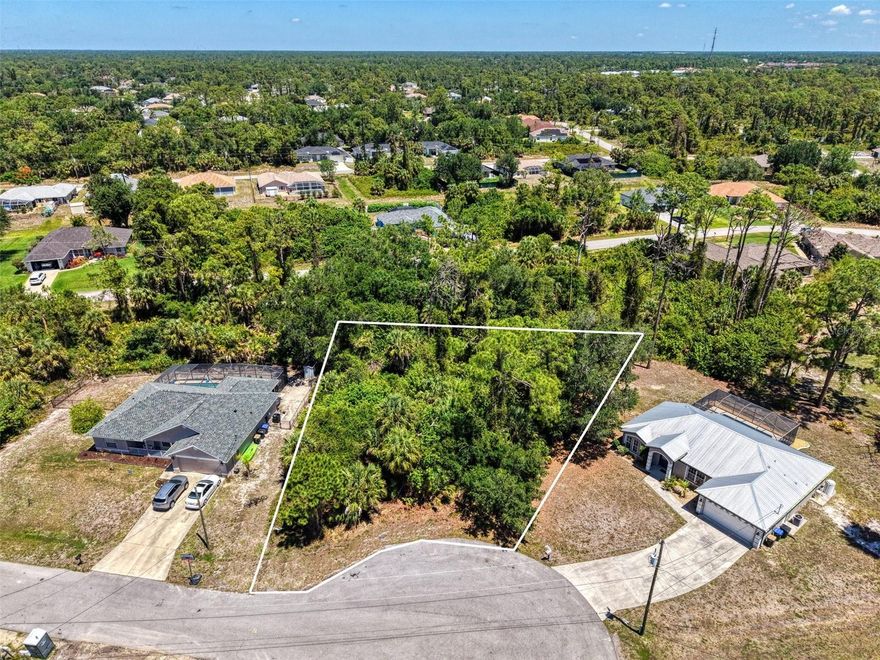 PRIME LOCATION! Don't miss this opportunity to purchase an Oversized building lot located at the end of a quiet cul-de-sac street in an area of new homes just off Toledo Blade Blvd. in North Port. Right next door to the lot is a Wonderful 3 bedroom In-ground pool home for sale situated on a half acre lot. Buy this lot and the home next door and have the possibility of owning a beautiful pool home, additional lot, all at the end of the cul-de-sac and own a third of an acre! The lot is oversized with almost 12,000 sq. ft. The location is ideal for commuters being located between I-75 and US-41. Can get everywhere quickly! 10 minute drive to the Atlanta Braves training stadium and the Tampa Bay Rays Port Charlotte Training stadium! Shopping, restaurants and schools all close by! 20-minute drive to the sandy white beaches. 15 minutes to downtown shops of Punta Gorda! Call us today!