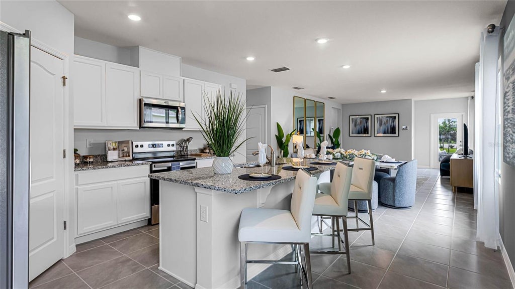 Photo of 9855 Brave Buck Avenue, Land O Lakes, FL 34638 (MLS # TB8550028)
