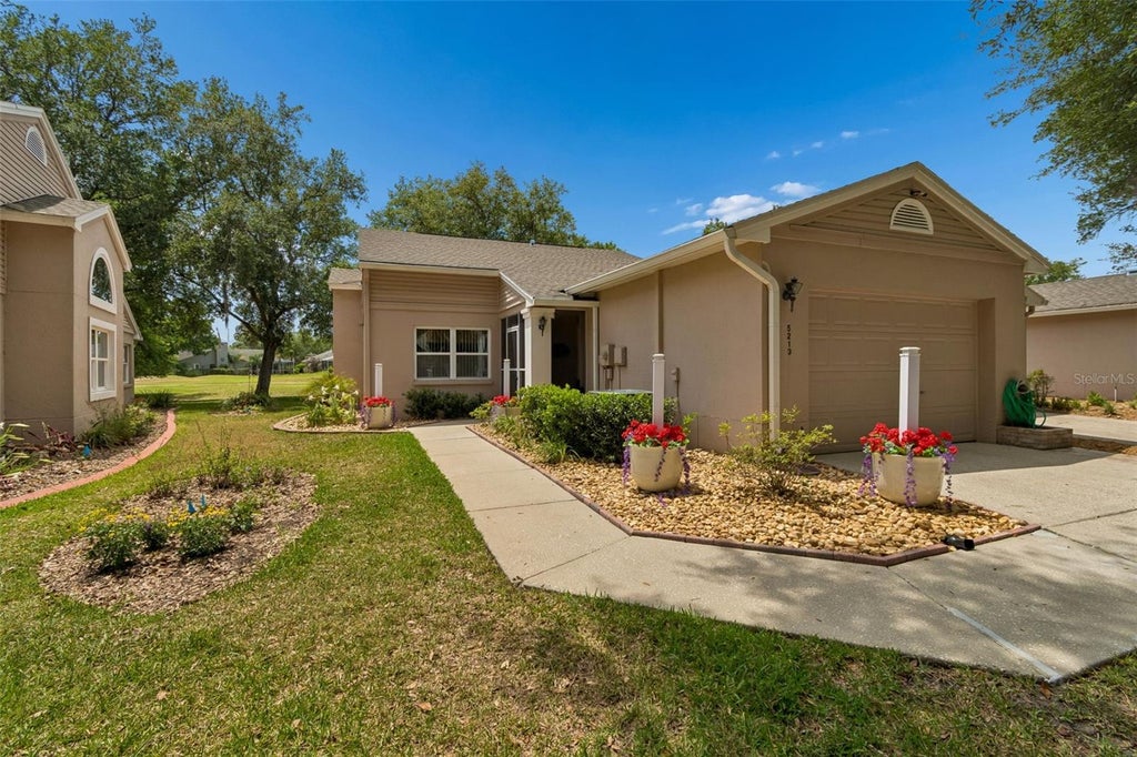 Photo of 5213 Lochmead Terrace, Zephyrhills, FL 33541 (MLS # TB8548751)