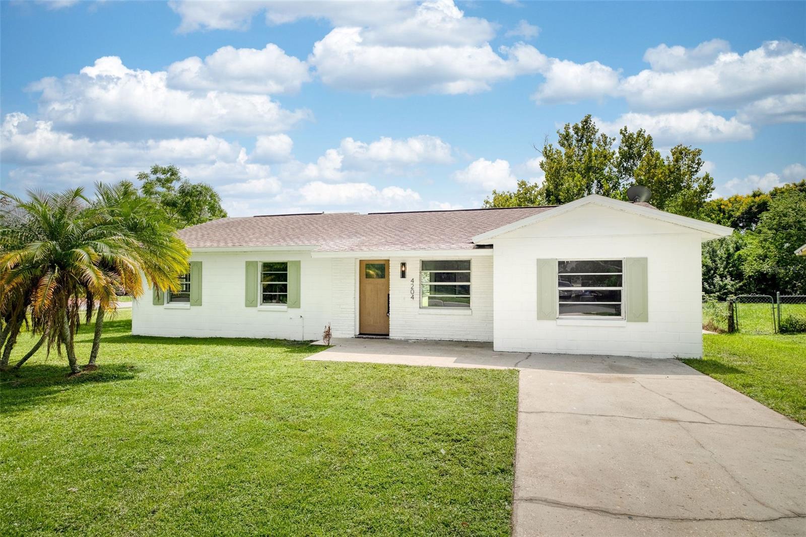 This move-in ready home has been fully updated inside and out, offering modern style and peace of mind with big-ticket upgrades. Featuring 4 spacious bedrooms and 2 beautifully renovated bathrooms, this property sits on a generous 0.44-acre lot, providing both comfort and room to grow.
Major Updates:
Roof (2017)
HVAC system (2017)
Fresh exterior & interior paint
Interior Upgrades You’ll Love:
Brand new luxury vinyl plank flooring throughout
Stylish new baseboards
Gorgeous updated kitchen with shaker cabinets, quartz countertops, custom backsplash, island, and stainless steel appliances
Modern recessed lighting in kitchen, hallways, and closets
Updated bathrooms with new vanities, mirrors, faucets, and fixtures
Upgraded fans, lights, door handles, and knobs throughout
This home is truly turn-key ready, blending modern finishes with practical updates. The oversized lot offers endless potential—room for a pool, outdoor living, or simply extra space to enjoy.
Don’t miss your chance to own this stunning, fully updated home—schedule your showing today!